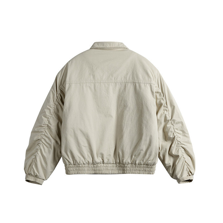 Men's short boxy blouson with shirt collar, utility chest pockets, and elastic hem Mune Fashion