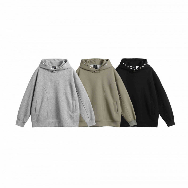 Unisex Oversize Hoodie made of mélange cotton blend with stud embellishments and seam details Mune Fashion