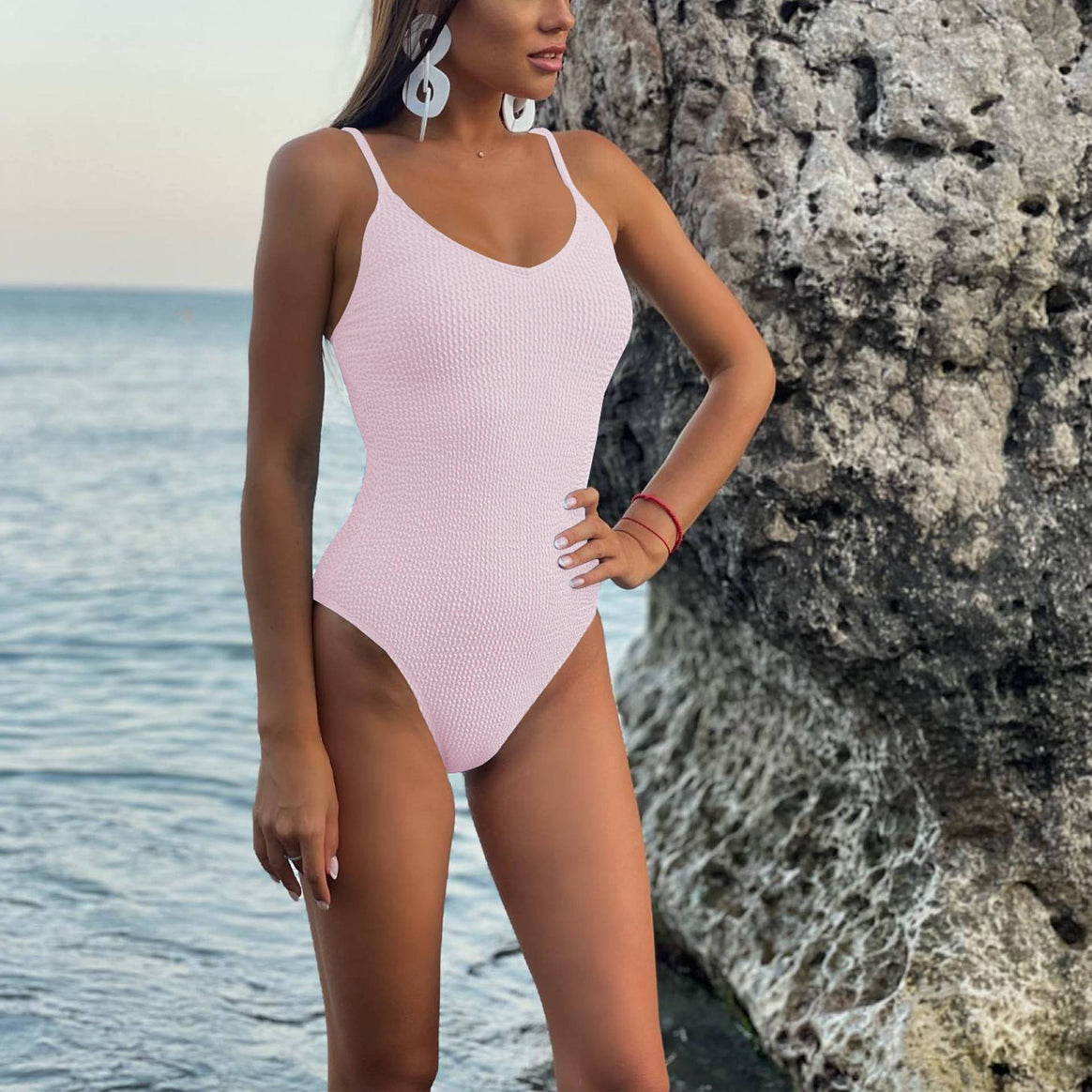 Ladies one-piece swimsuit with fine waffle pattern and deep V-neck Mune Fashion