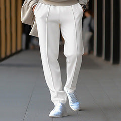 Women slim-fit jogging pants with decorative crease and narrow leg Mune Fashion
