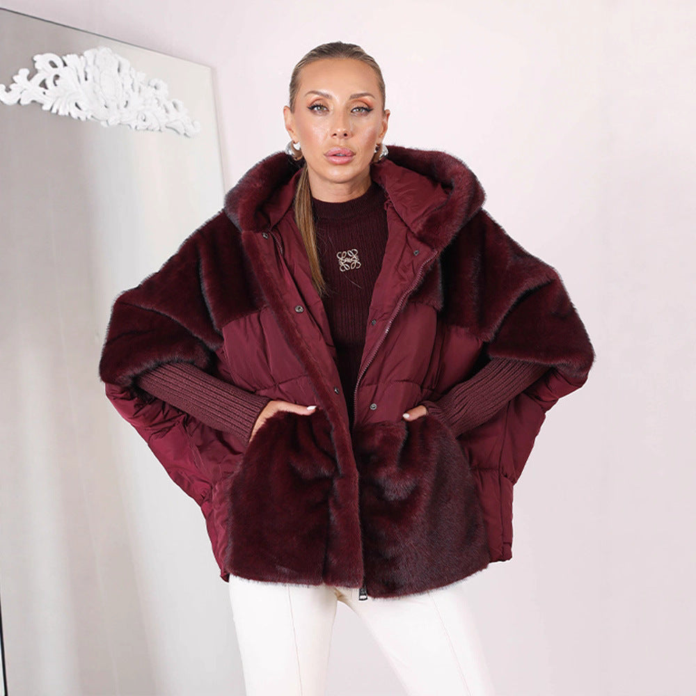 Women's short quilted jacket in cocoon cut with voluminous faux fur trim and hood Mune Fashion