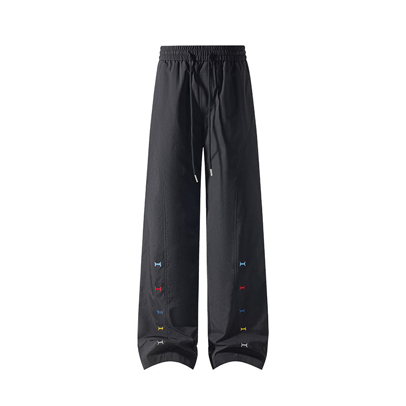 Women's sporty leisure pants with elastic waistband and colorful detail Mune Fashion
