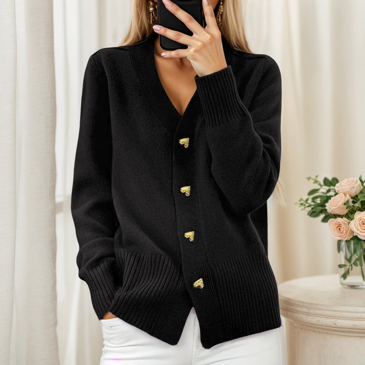 Women's loose knit cardigan with heart buttons and ribbed hem Mune Fashion
