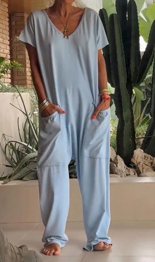 Women's comfortable oversized jumpsuit with V-neck, deep crotch and inset pockets Mune Fashion