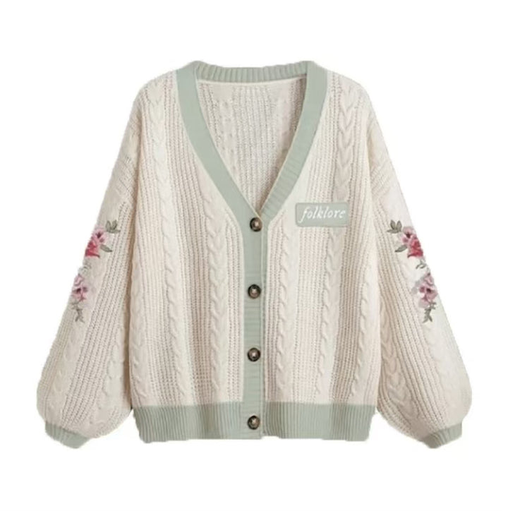 Women's knitted oversized cardigan with cable pattern, V-neck, button placket, and floral sleeve embroidery Mune Fashion