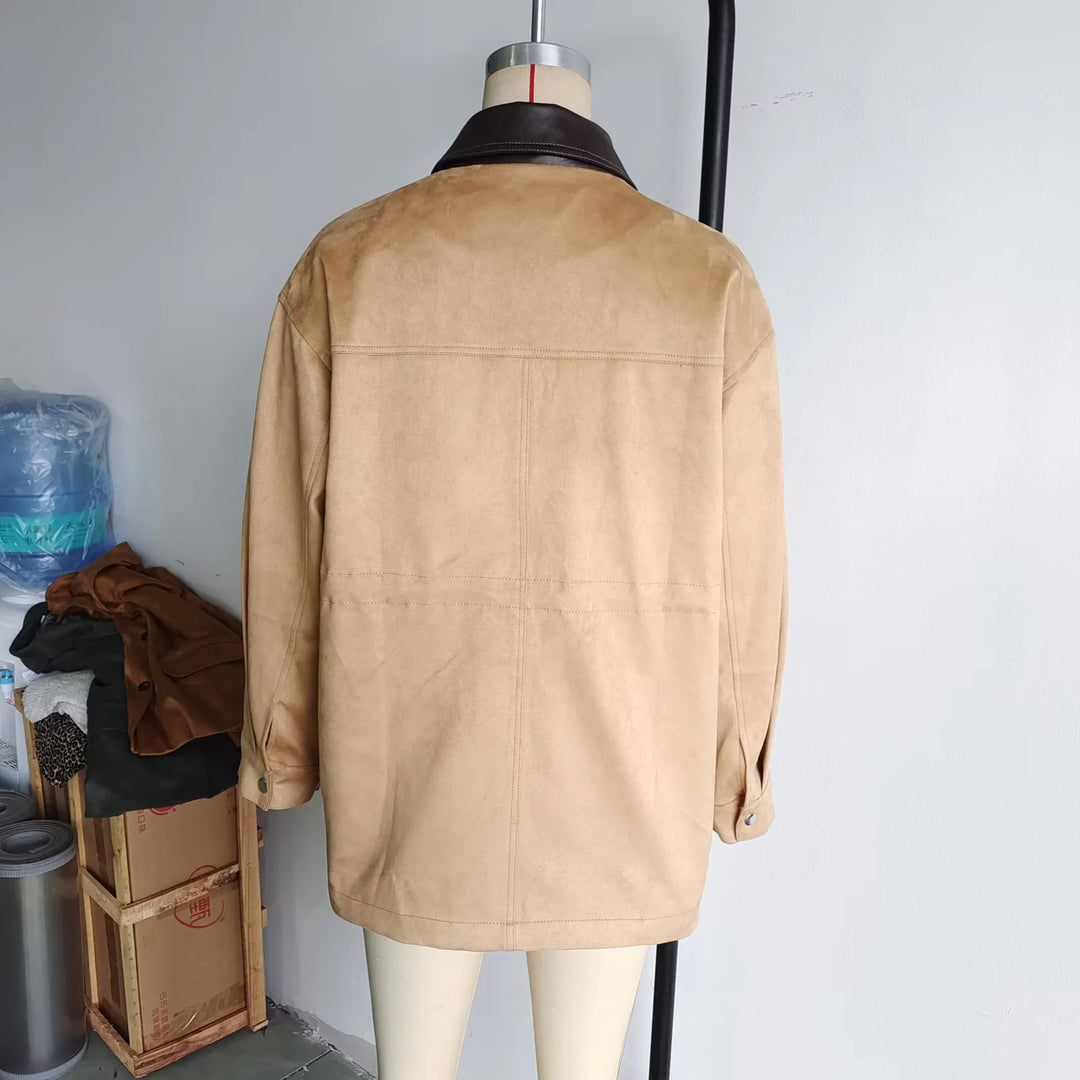 Ladies oversized field jacket with contrasting leather collar, concealed zipper, and large patch flap pockets Mune Fashion