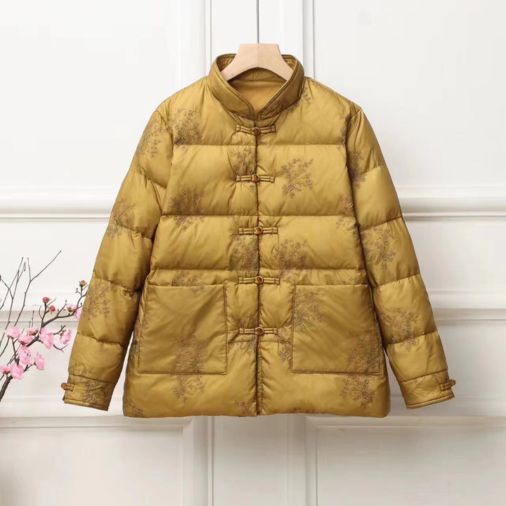 Women's padded quilted jacket with stand-up collar and traditional button placket Mune Fashion
