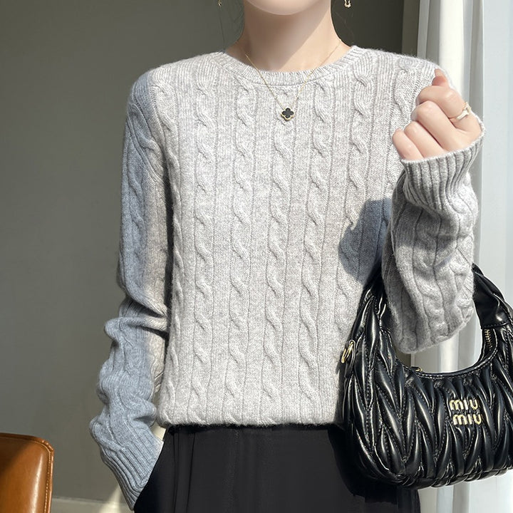 Women's cable knit round neck sweater made of soft wool blend with ribbed cuffs Mune Fashion
