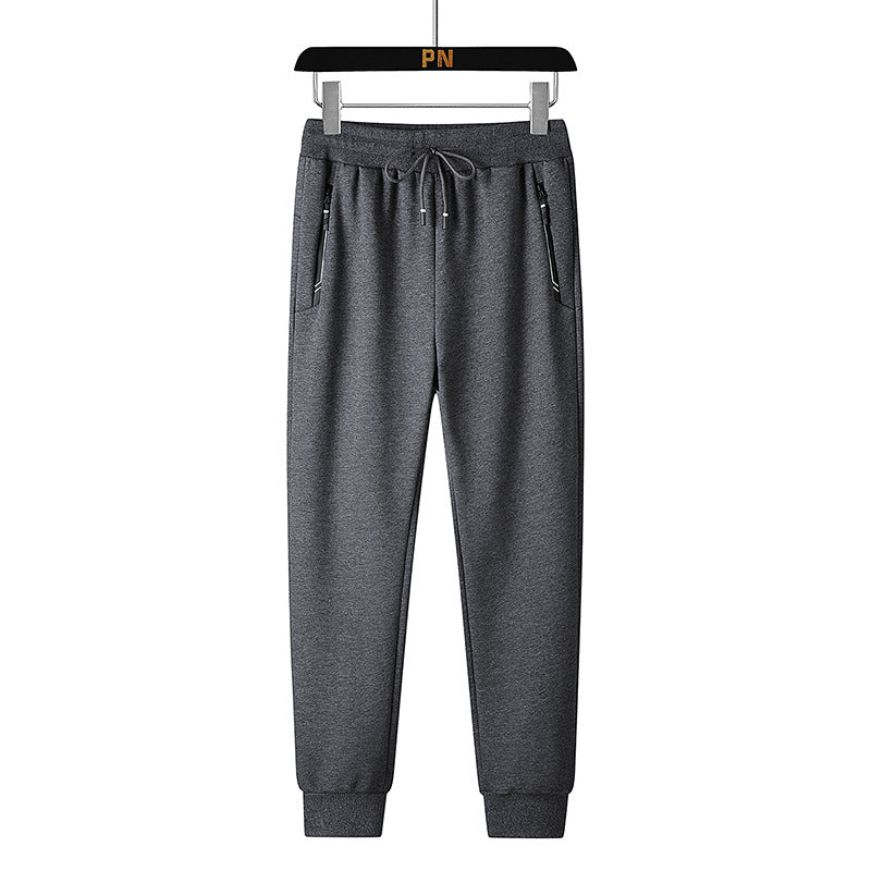 Men's thermo fleece jogging pants with brushed inner side, reflective zipper pockets and drawstring waistband Mune Fashion