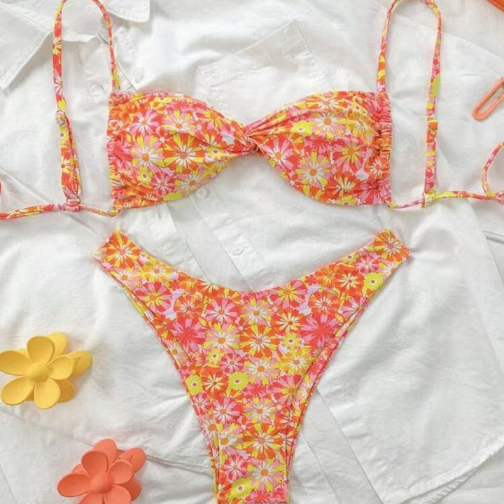 Women's triangle bikini with floral design and playful ruffle details Mune Fashion