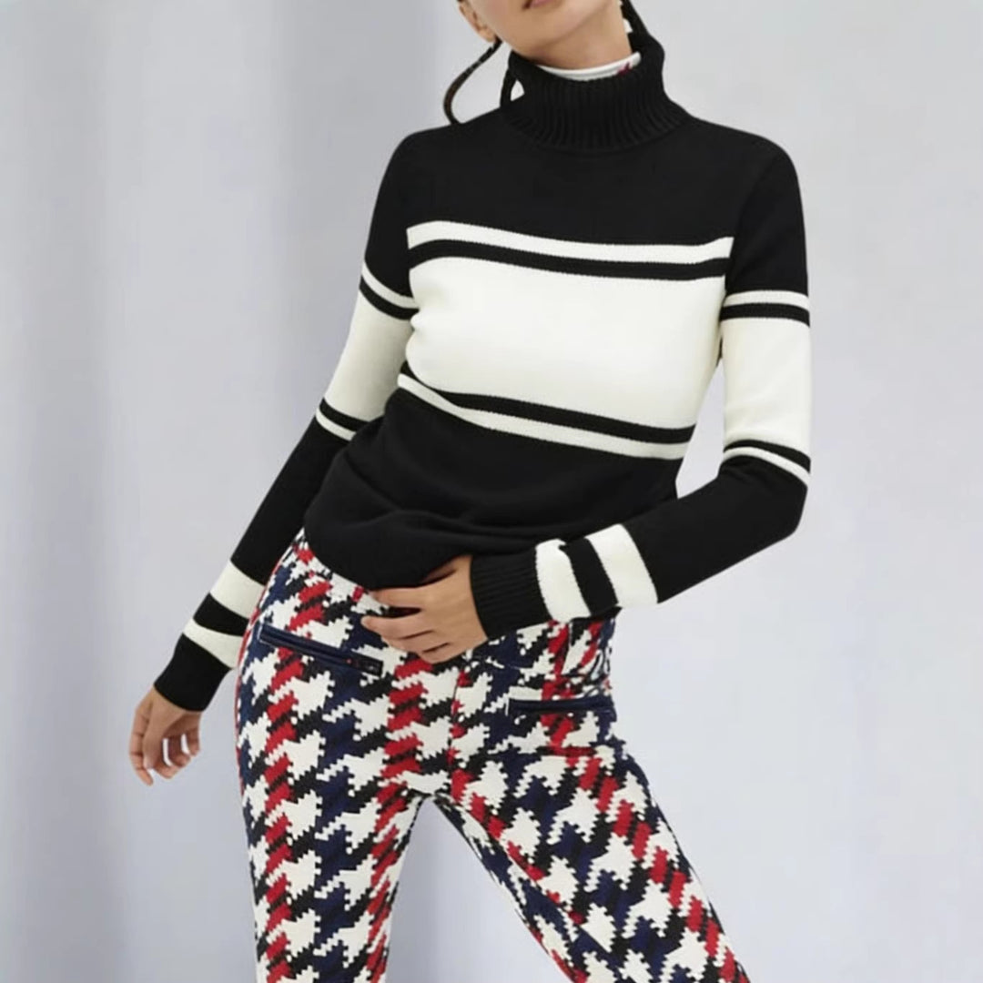 Women's long turtleneck knit dress with star motif, block stripes and elastic ribbed hem