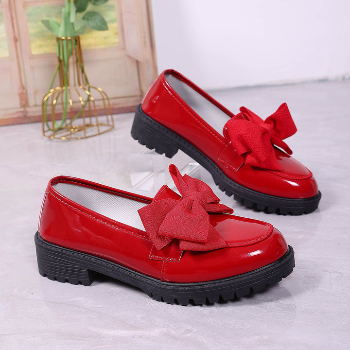 Women's patent leather platform loafers with patterned rubber sole and decorative bow Mune Fashion