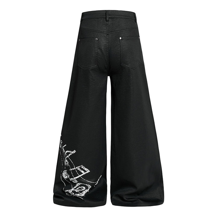 Women's wide high-cut palazzo pants with coated leather look, extra wide leg and statement print Mune Fashion