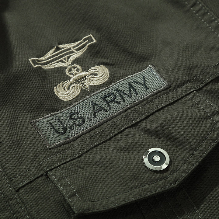 Men's military-inspired cotton canvas bomber jacket with high stand-up collar and chest flap pockets Mune Fashion