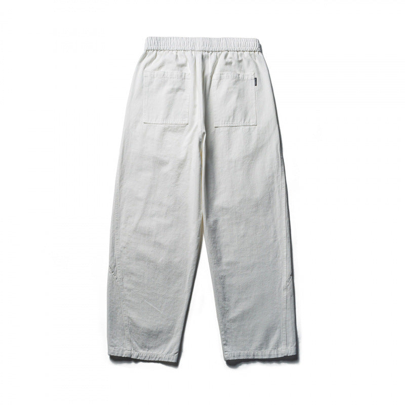 Unisex locker cut cropped leisure pants with elastic waistband, drawstring, and carabiner detail Mune Fashion