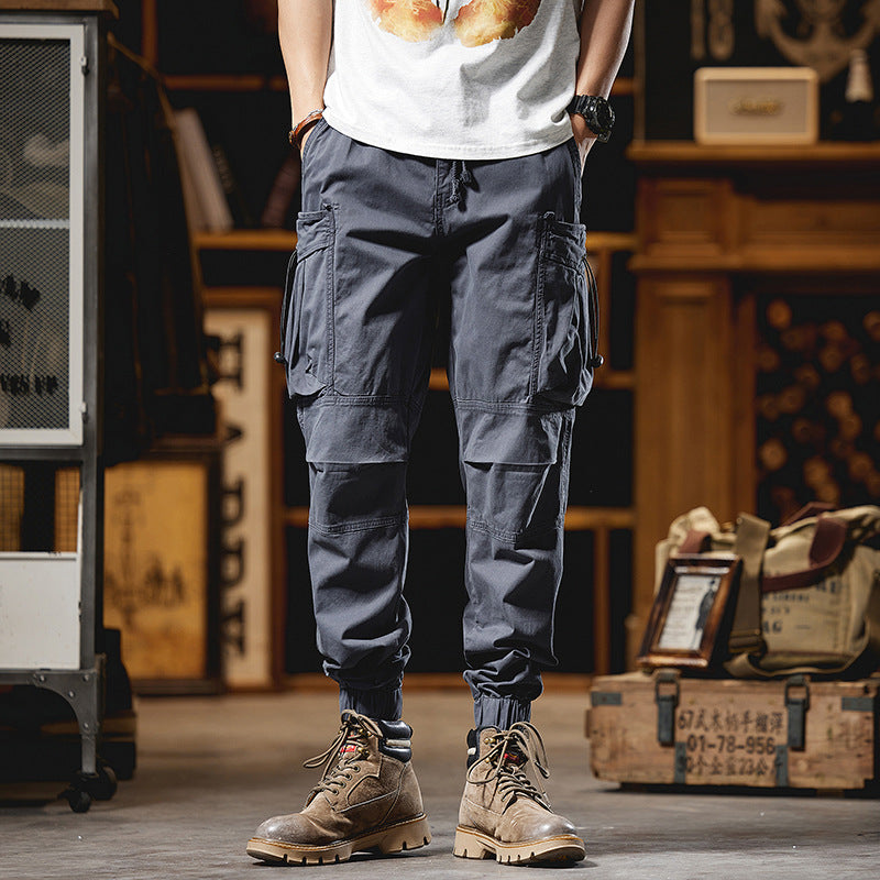 Men's military-inspired cargo pants with elastic tunnel drawstring waistband, flap and zipper pockets Mune Fashion