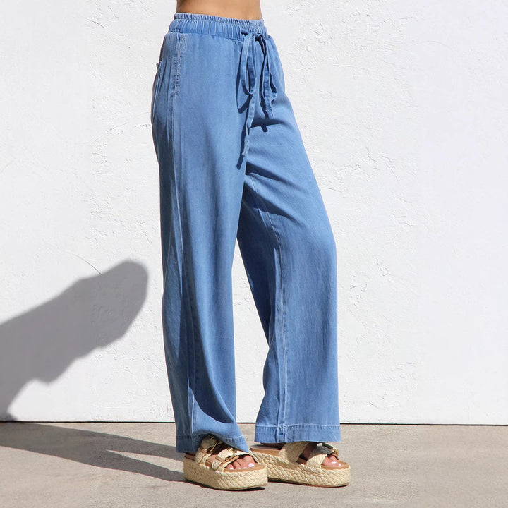 Ladies' wide linen-look summer trousers with elastic waistband, drawstring, and side pockets Mune Fashion