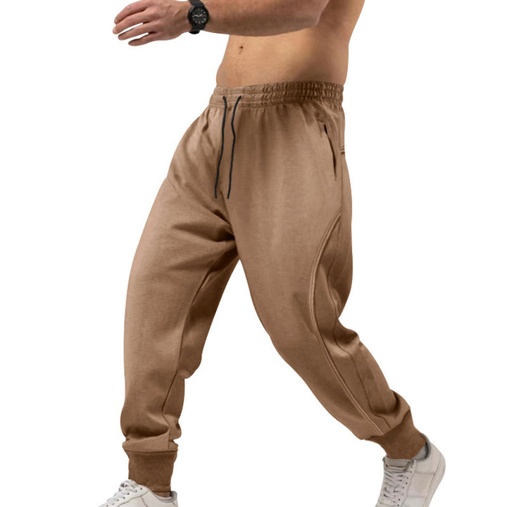 Men's versatile sweat jogging pants with ergonomic knee inserts, elastic comfort waistband, and concealed zip pockets Mune Fashion