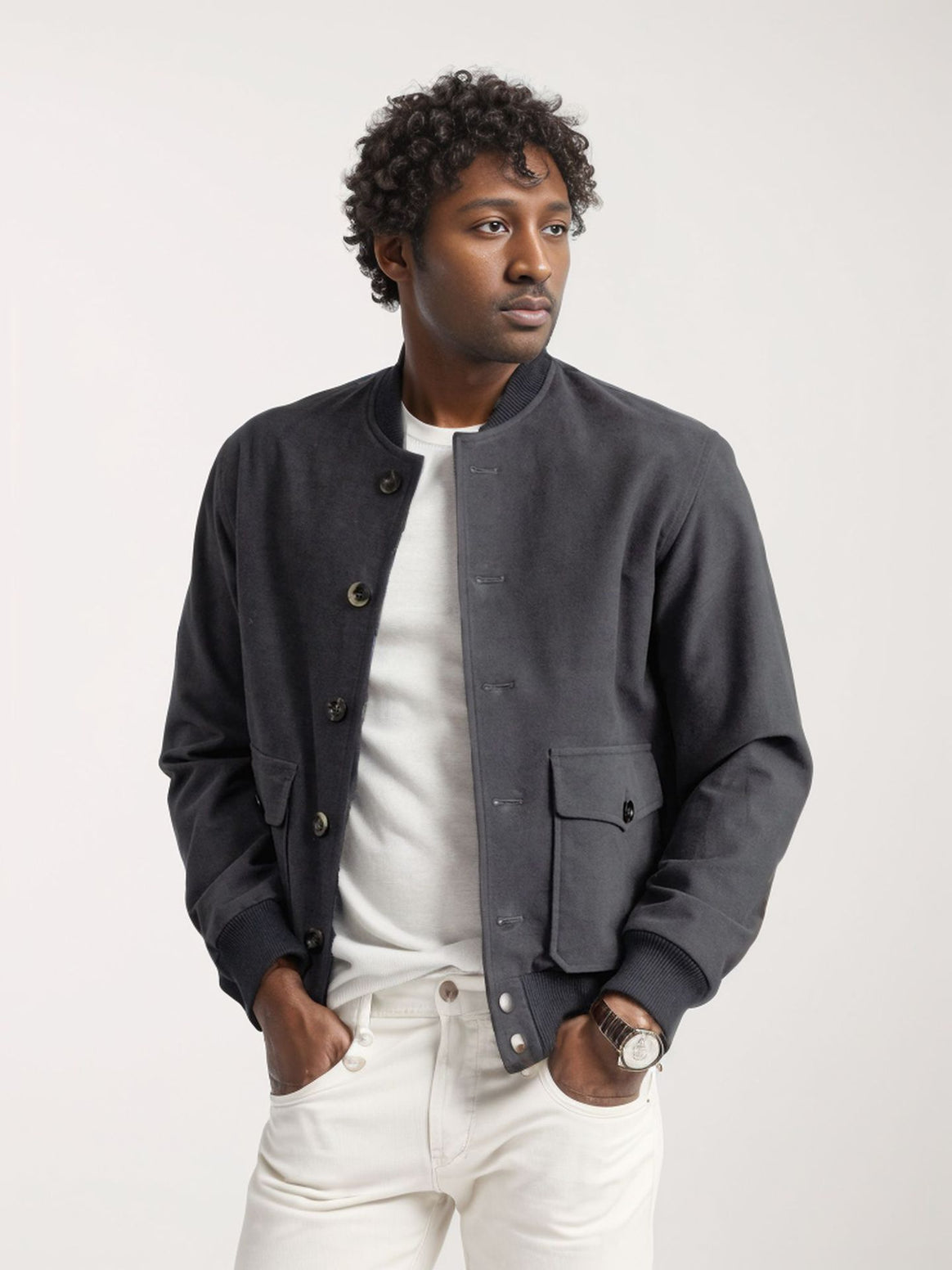 Men's bomber-style short jacket with button closure and flap pockets Mune Fashion