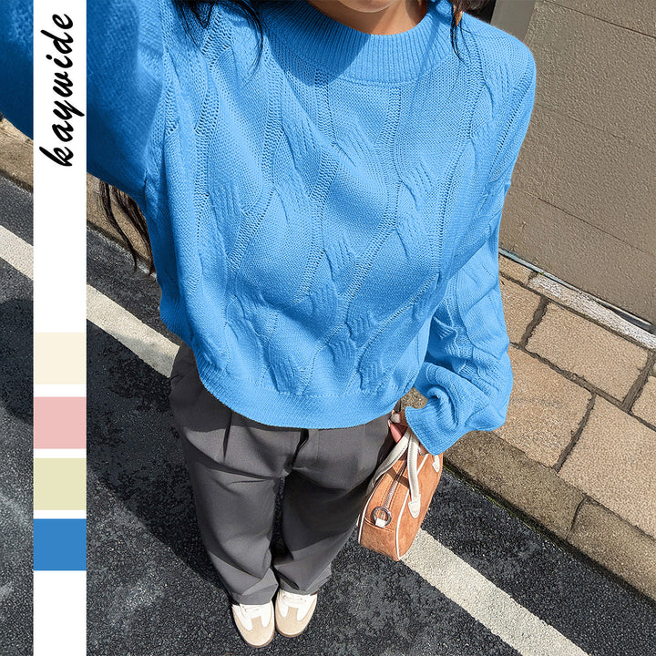 Women's cropped cable knit sweater with boxy silhouette, dropped shoulder, and ribbed hem Mune Fashion