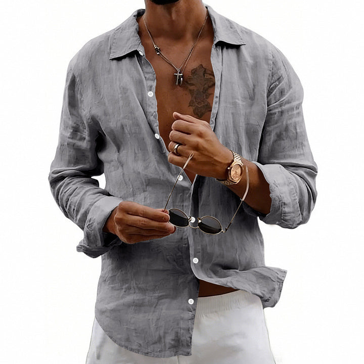 Men's airy relaxed linen shirt with open lapel, rounded hem, and roll-up sleeves Mune Fashion