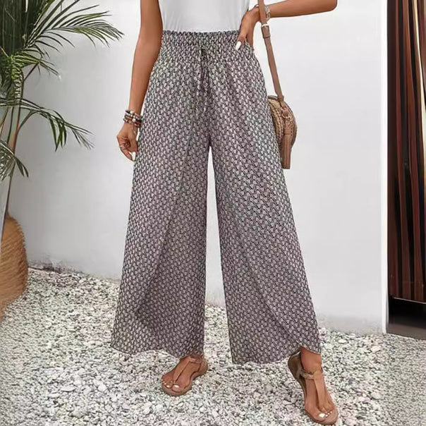 Women's wide summer palazzo pants with gathered comfort waistband, flowing leg width and geometric all-over pattern Mune Fashion