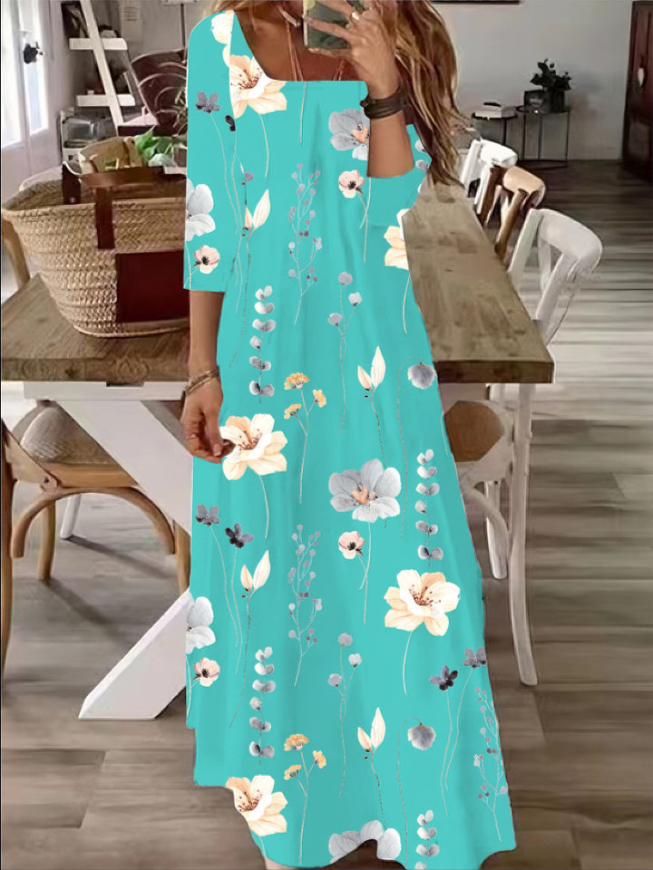 Women's Flowing Maxi Dress with Three-Quarter Sleeves, Boat Neck and Floral Allover Print Mune Fashion