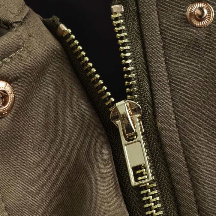 Women's oversized short utility blouson jacket with shirt collar, large patch pockets, and tailored cuffs Mune Fashion