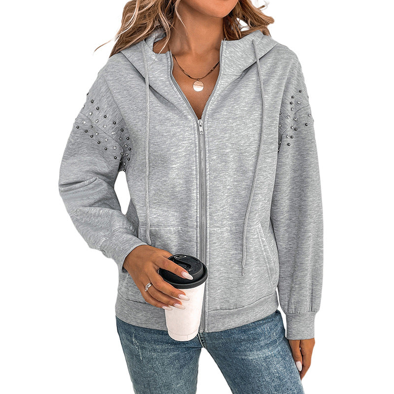 Women's zip-up hoodie with pearl detail on the sleeves Mune Fashion