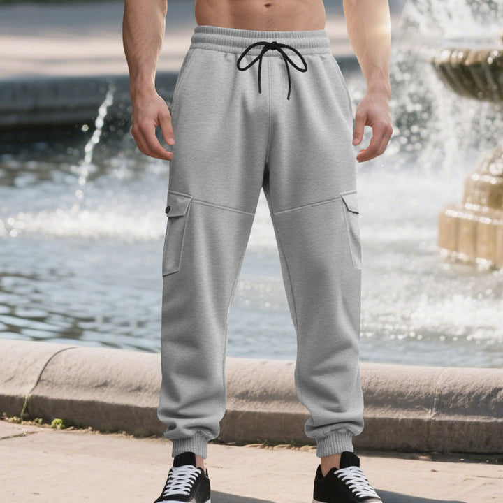 Men's urban-military cargo joggers with knee-quilted inserts, side flap pockets, and ribbed leg openings Mune Fashion
