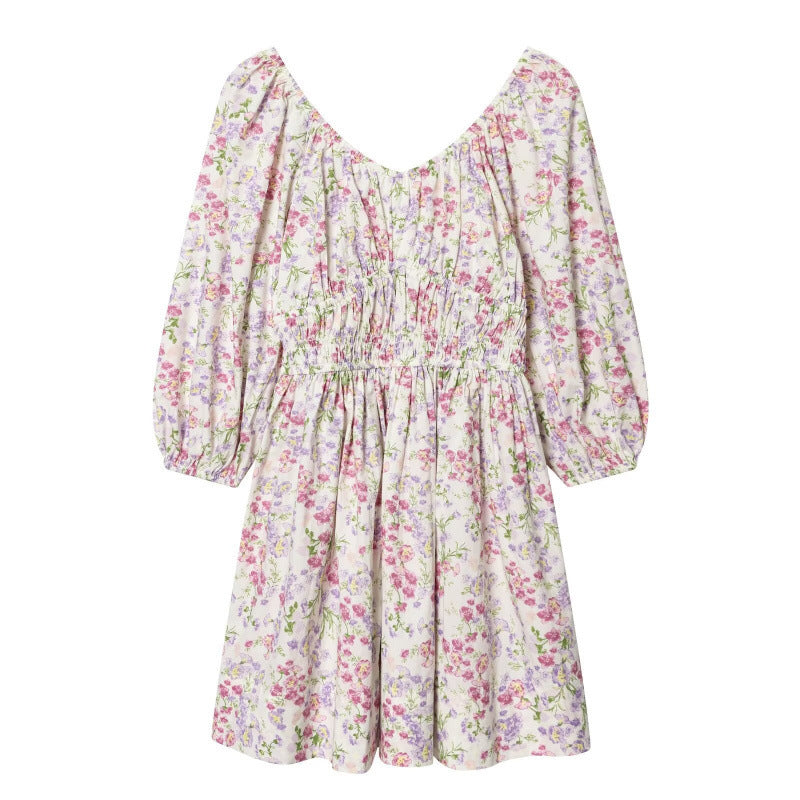 Women's floral dress with smocked waist and voluminous puff sleeves Mune Fashion