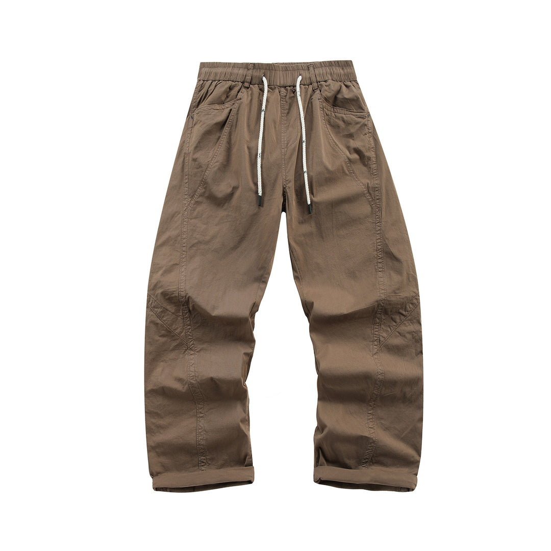 Men's Light Relaxed-Fit Trousers with Drawstring, Slanted Side Pockets and Panel Seams Mune Fashion