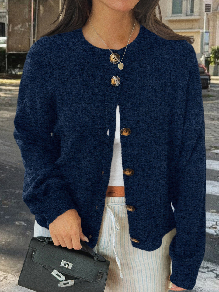 Women's cozy oversized knitted cardigan with horn button placket and round neckline Mune Fashion