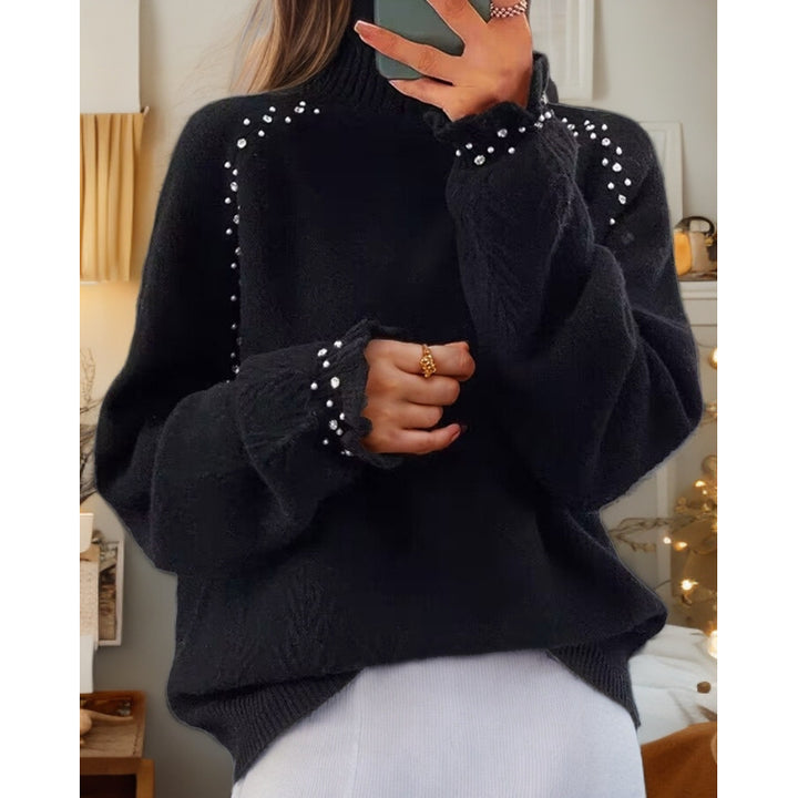 Ladies oversized knit sweater with stand-up collar and pearl details Mune Fashion