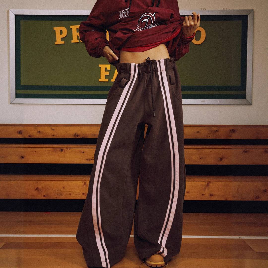 Women loose Balloon Pants with paperbag waistband, long drawstring and side contrasting stripes Mune Fashion