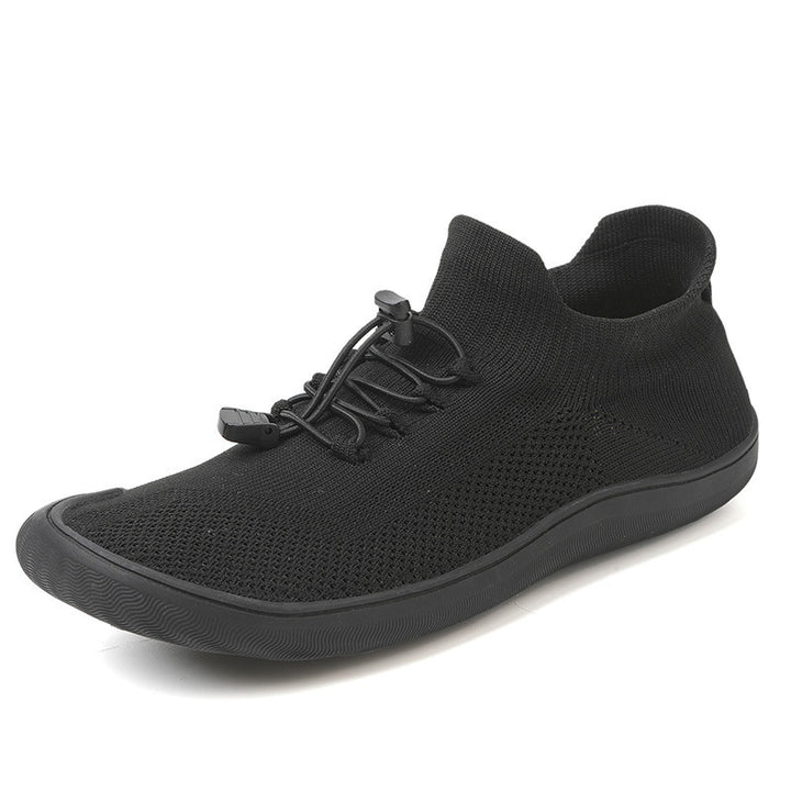 Unisex slim-knit slip-on trainer with toggle lacing and ultra-flexible minimal sole Mune Fashion
