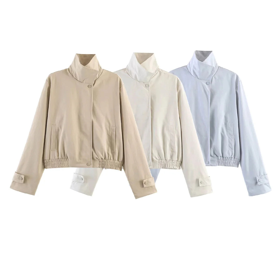 Women's short-cut bomber jacket with stand-up collar, snap button placket, and elastic hem Mune Fashion