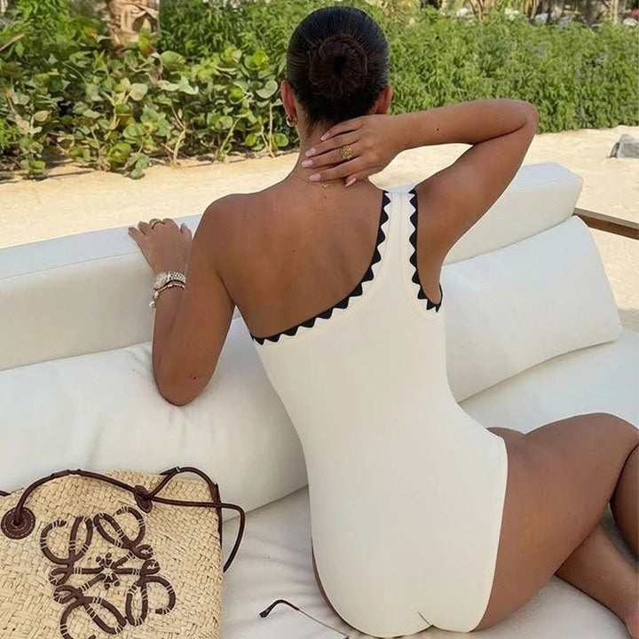 Women's One-Piece Swimsuit with Asymmetric Design and Matching Skirt Mune Fashion