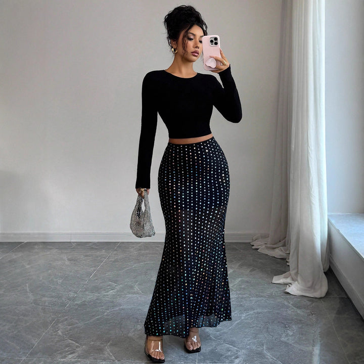 Women's figure-hugging maxi skirt with holographic sequins, high waist and semi-transparent net trim Mune Fashion