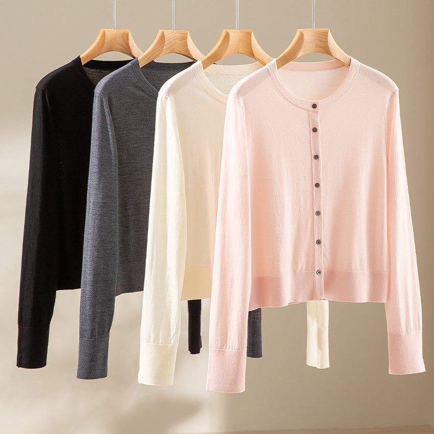 Women's light fine knit cardigan in cropped cut with round neck and continuous button placket Mune Fashion