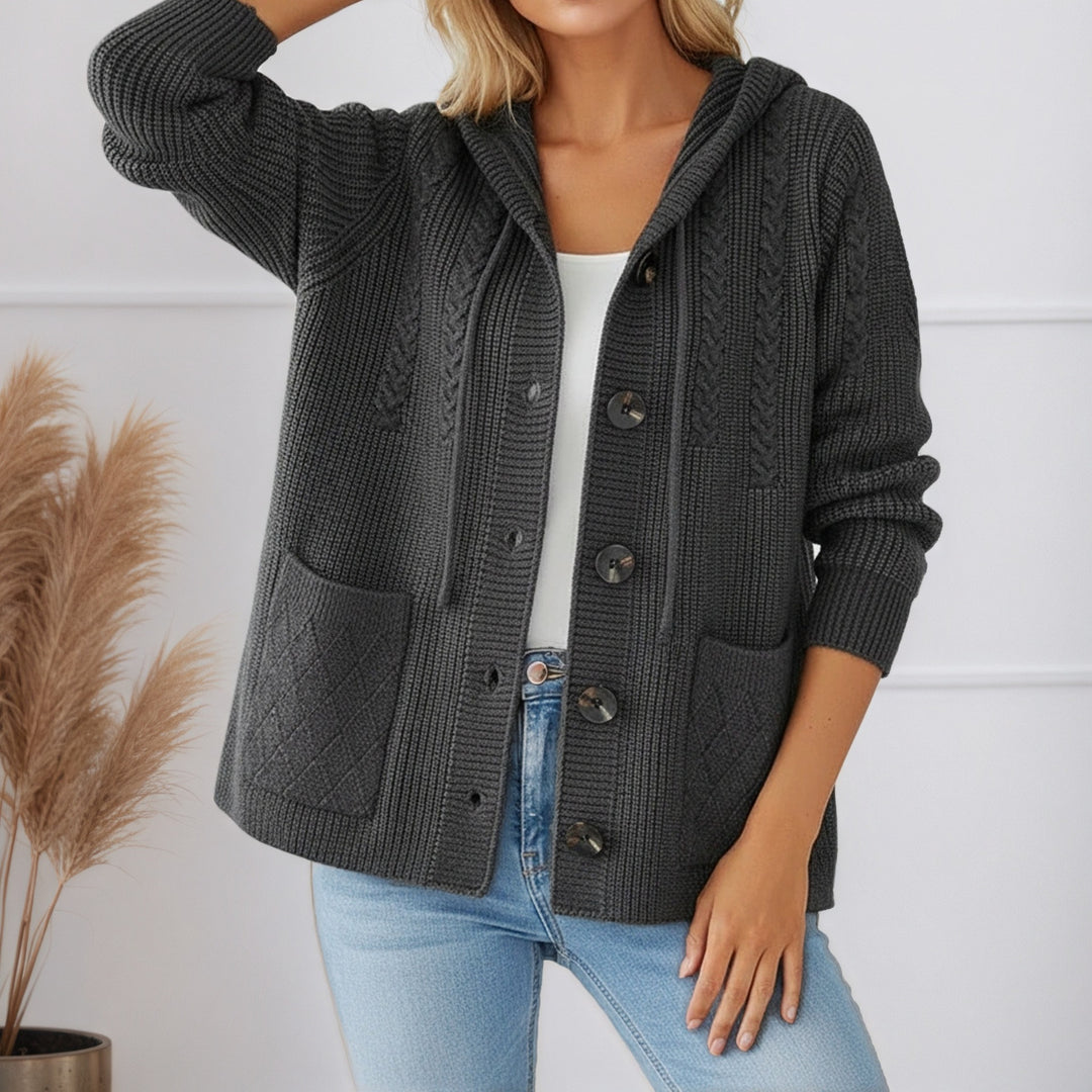 Women's knitted hooded cardigan with ribbed pattern, large wooden buttons, and patch pockets Mune Fashion