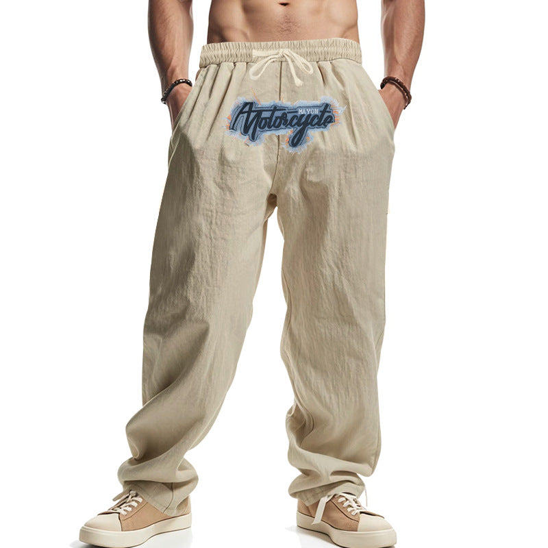 Men's loosely fitting linen look relax pants with elastic waistband, drawstring & front print Mune Fashion