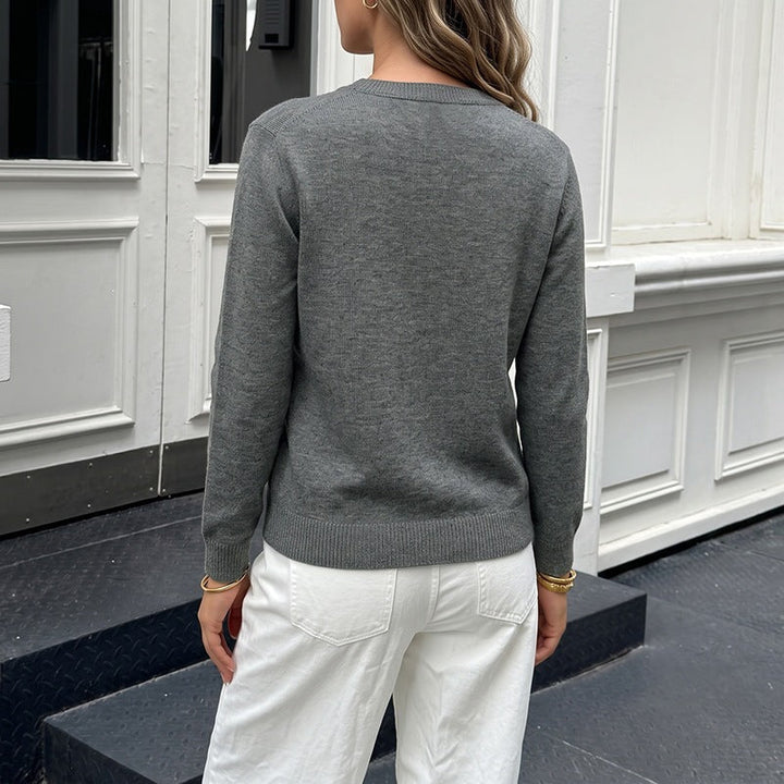 Women's fine knit cardigan with contrast colored buttons and round neck Mune Fashion