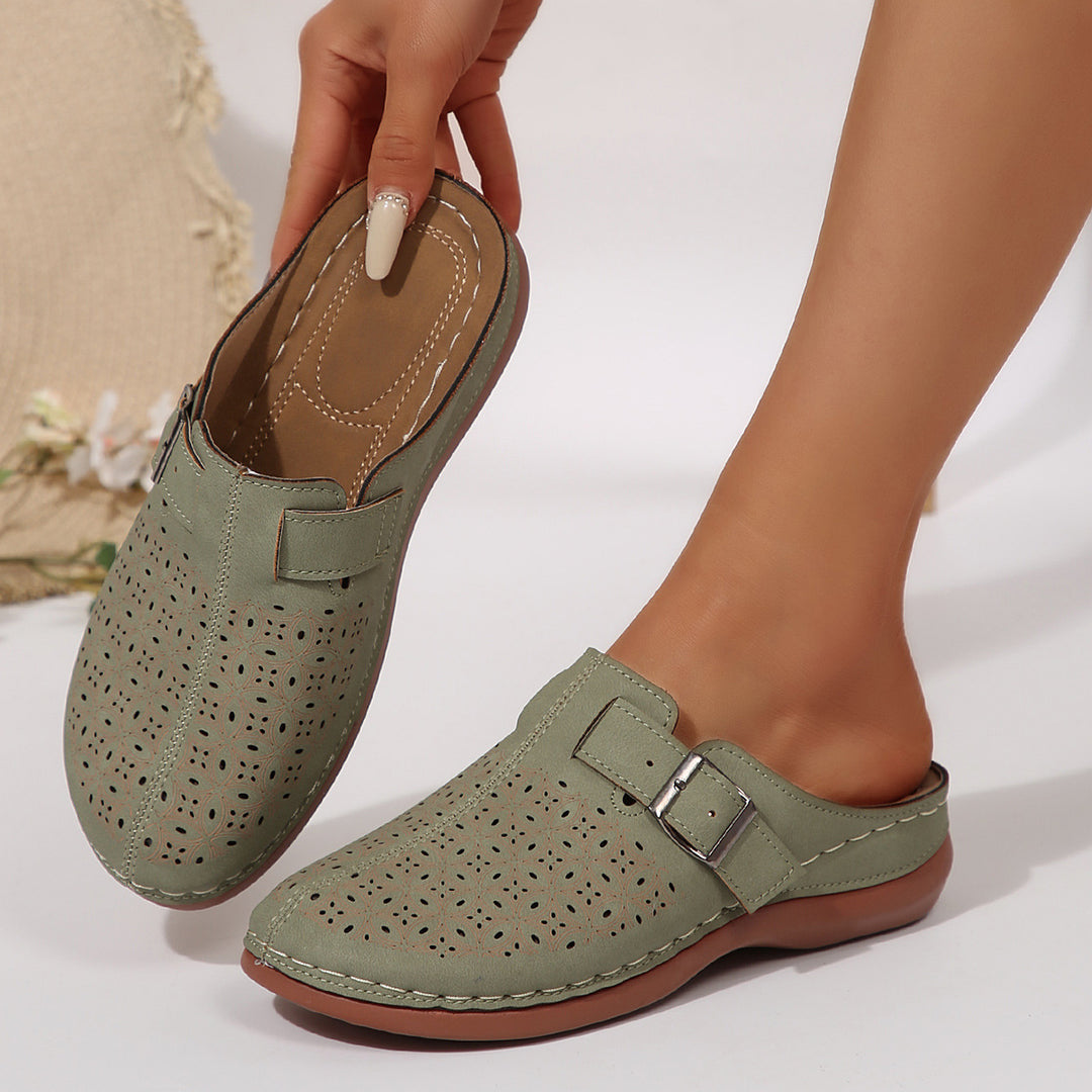 Damen Perforierte Komfort-Mules mit Zierlochmuster, verstellbarem Schnallenriemen und gepolstertem Fußbett Mune Fashion