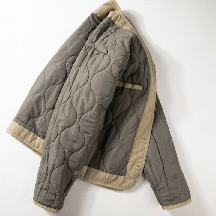 Men's light quilted collarless transitional jacket with button placket and patch pockets Mune Fashion