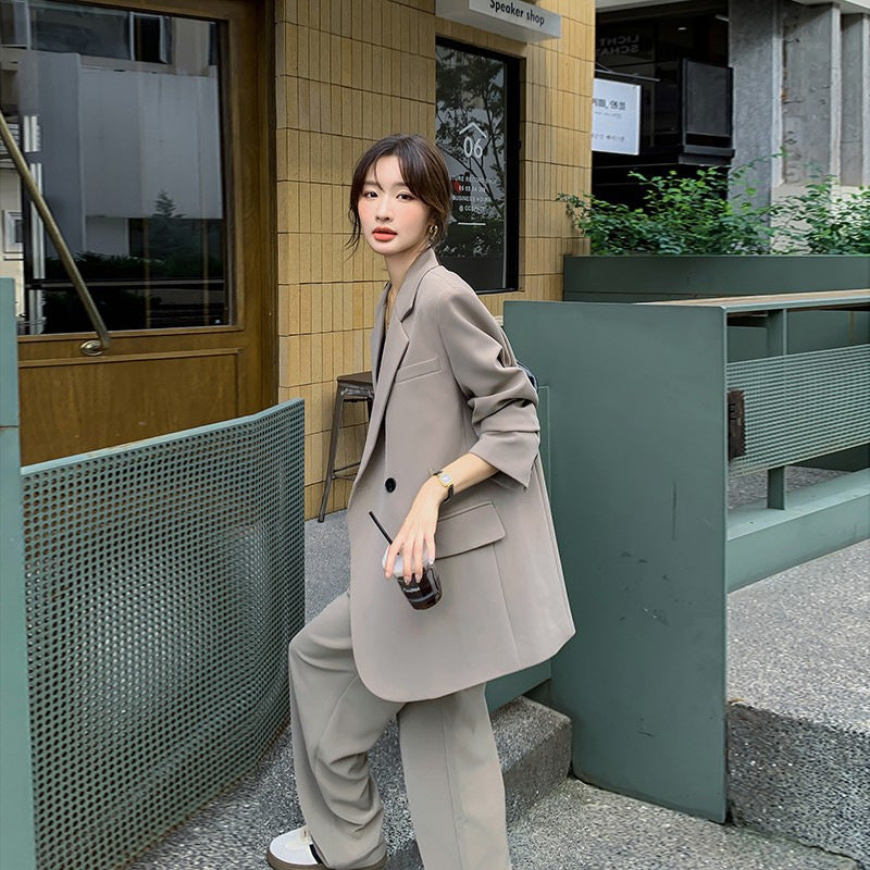 Women's Oversize two-piece made of flowing crepe with lapel blazer and wide pleated trousers Mune Fashion