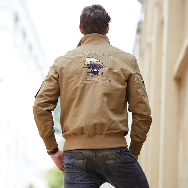 Men's short-cut bomber jacket made of canvas with emblem patches and arm pocket Mune Fashion