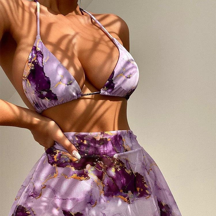 Women's bikini set with creative wrap design and floral skirt Mune Fashion