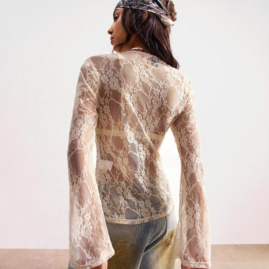Women's delicate lace cardigan with tailored silhouette and button placket Mune Fashion
