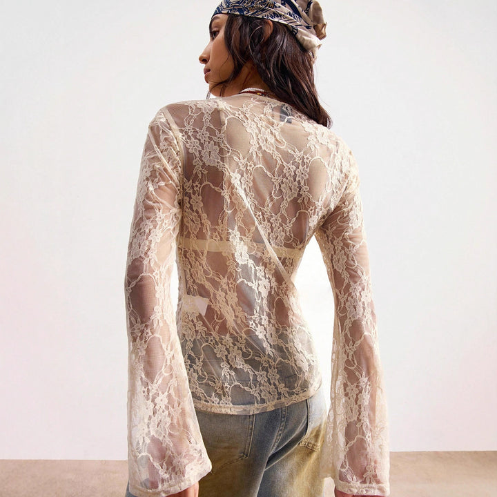Women's delicate lace cardigan with tailored silhouette and button placket Mune Fashion